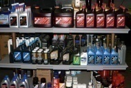Chemical bottles on display shelves.